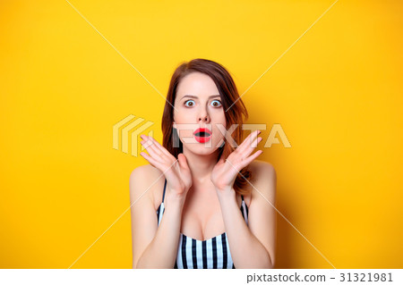 Beautiful woman on yellow background Beautiful woman on yellow background 31321981