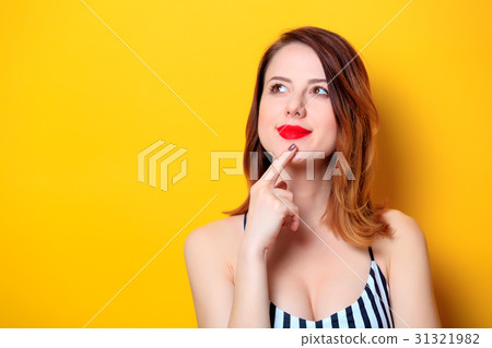 Beautiful woman on yellow background Beautiful woman on yellow background 31321982