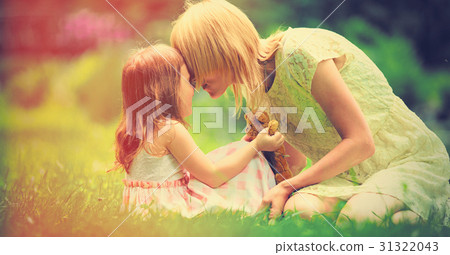 Young mother and little girl have a rest Young mother and little girl have a rest 31322043