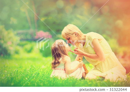 Young mother and little girl have a rest Young mother and little girl have a rest 31322044