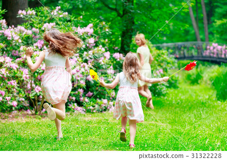 mother and two sisters running and hiding mother and two sisters running and hiding 31322228