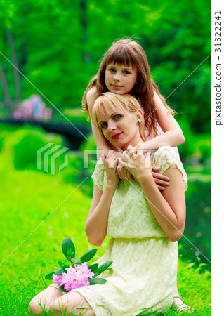Young mother and little girl have a rest Young mother and little girl have a rest 31322241