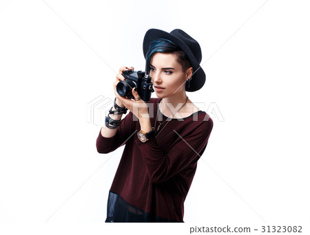 Portrait of smiling girl taking shot with vintage Portrait of smiling girl taking shot with vintage 31323082