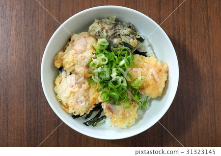 Bowl of rice and fried fish 31323145