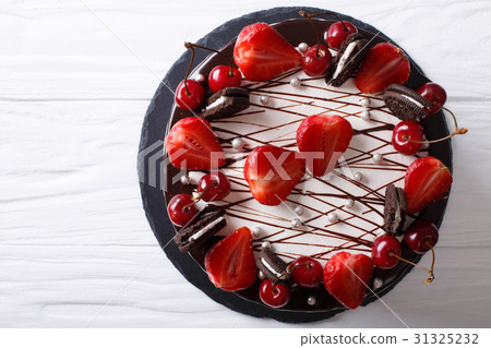 festive chocolate cake with strawberries festive chocolate cake with strawberries 31325232