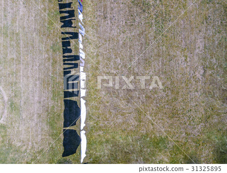 Aerial of clothes drying on a clothesline 31325895