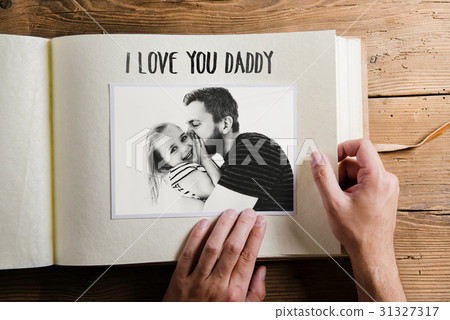 Fathers day concept. Photo album. Wooden 31327317