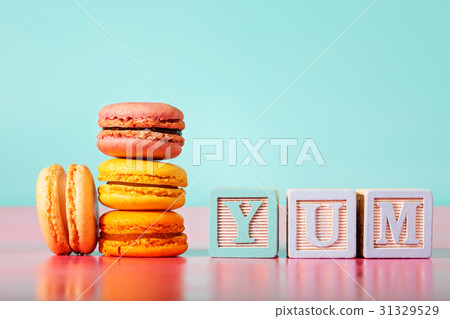 Stack of macarons on pastel background 31329529