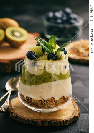 Dessert with yogurt,muesli,blueberries and kiwi 31329694