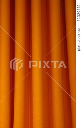 Heavy orange felt textile curtain fold background 31329861