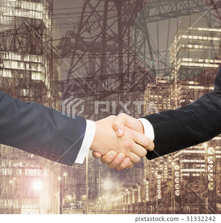 Handshake on background with transmission tower Handshake on background with transmission tower 31332242