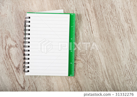 Notebook in line on table 31332276