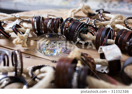 The store selling different leather bracelets 31332386