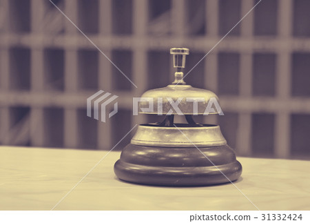 bell on reception desk 31332424