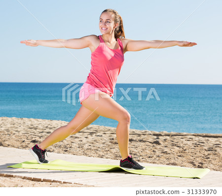 Girl training at sea beach Girl training at sea beach 31333970