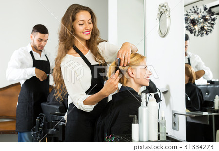 woman in the barbershop woman in the barbershop 31334273