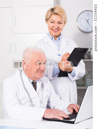 Male doctor and nurse Male doctor and nurse 31334403