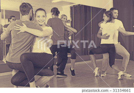men and women dancing bachata together 31334661