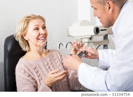 Checking eyesight in clinic. 31334754