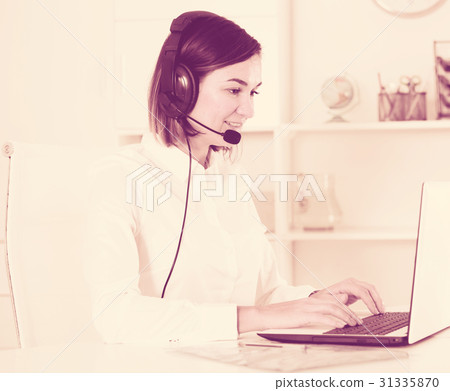 Woman in call-centre 31335870
