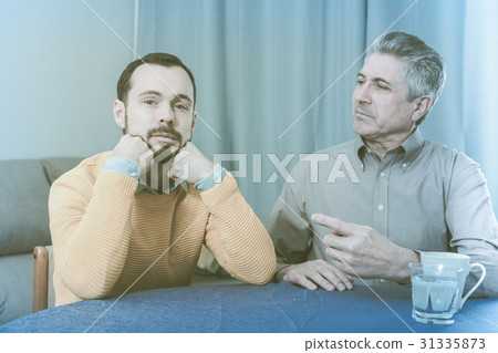 Mature father and son serious talk 31335873