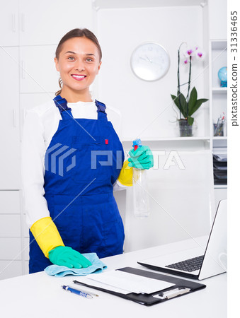 Woman cleaning at company office Woman cleaning at company office 31336465