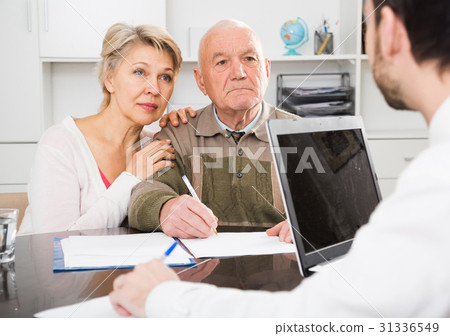 Old man and woman in social department 31336549