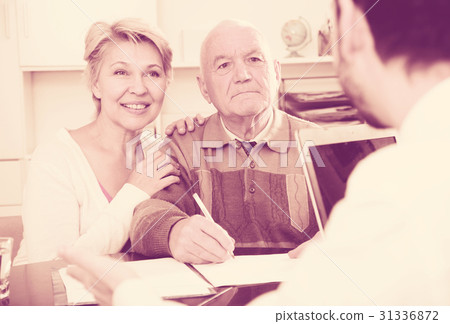 Old man and woman in social department 31336872