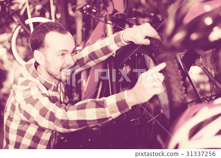 Male customer in bike shop 31337256