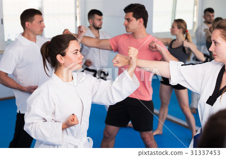 Adults training at karate class 31337453
