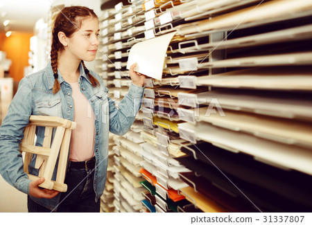 Smiling girl shopping multicolored paper 31337807