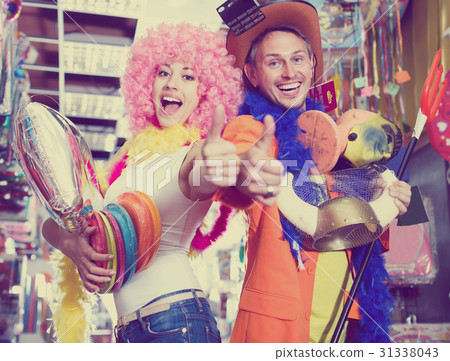 Merry guy and girl are happy shopping 31338043