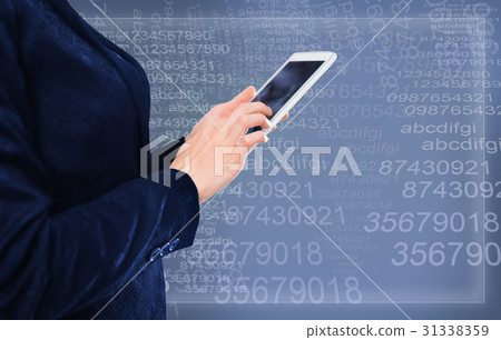 Businesswoman writing sms 31338359