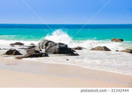 turquoise sea white sand at Bainhat beach Condao.  31342444