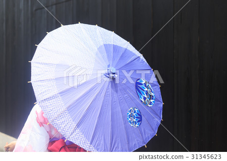 Summer image A young lady in a yukata standing umbrella Summer image A young lady in a yukata standing umbrella 31345623