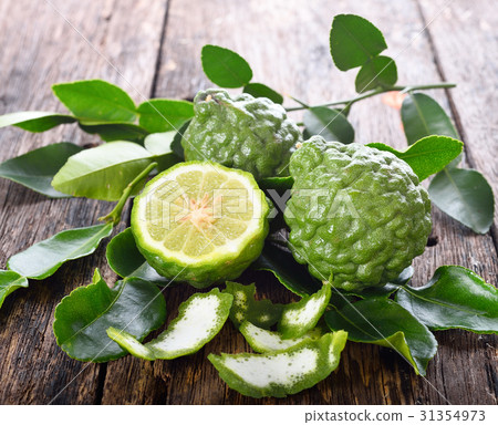 Fresh bergamot on wooden background 31354973