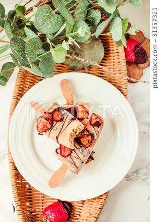 Group of homemade strawberry vanilla popsicles Group of homemade strawberry vanilla popsicles 31357321