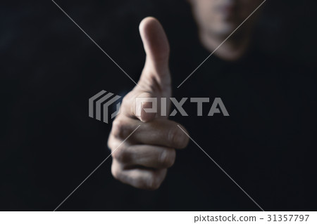 man pointing his finger as a gun man pointing his finger as a gun 31357797