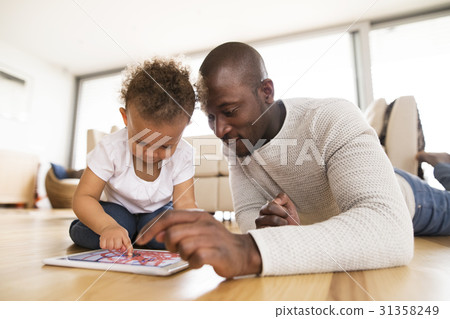 Afro-american father with little daughter with Afro-american father with little daughter with 31358249