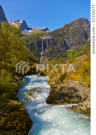 Waterfall near Briksdal glacier - Norway Waterfall near Briksdal glacier - Norway 31358571