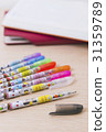 A brush, a letter, a written book 31359789