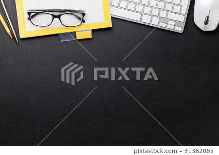 Office desk with computer and supplies 31362065