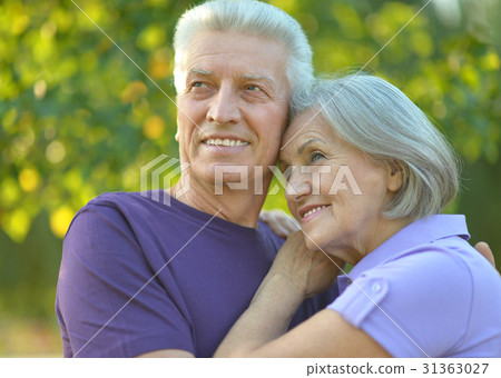 senior couple hugging senior couple hugging 31363027