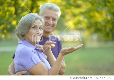 senior couple resting outdoors senior couple resting outdoors 31363029