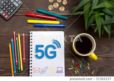 Businessman left a notes 5G with pencil in Notepad Businessman left a notes 5G with pencil in Notepad 31363257