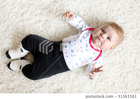 Portrait of cute adorable newborn baby child 31363381