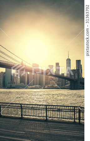 Sunset over Manhattan and Brooklyn Bridge 31363702