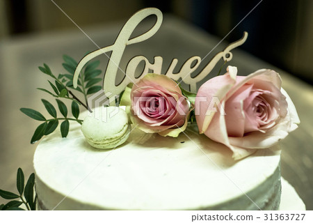 Beautiful wedding cake with cream With text Love Beautiful wedding cake with cream With text Love 31363727