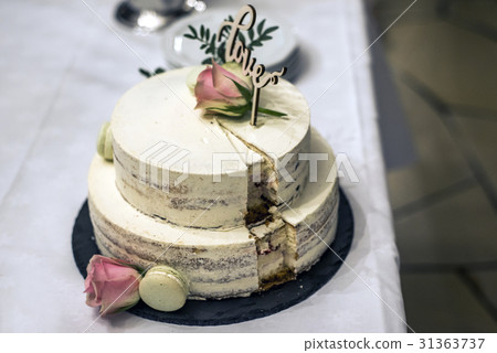 Beautiful wedding cake with cream With text Love Beautiful wedding cake with cream With text Love 31363737