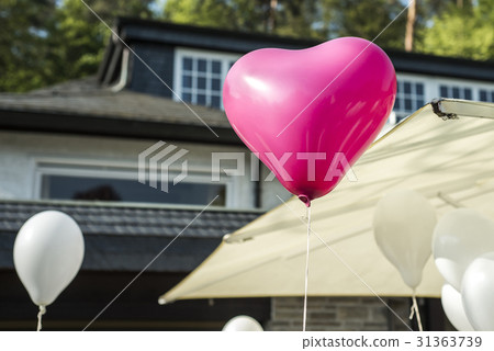 White and pink festive balloons shape of heart White and pink festive balloons shape of heart 31363739